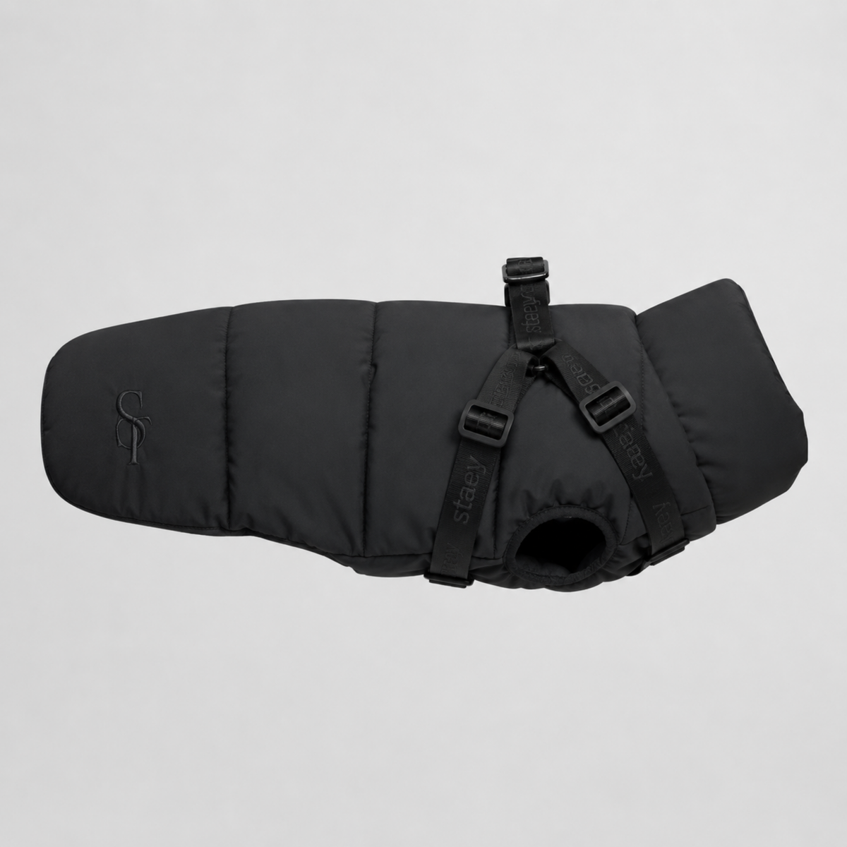 Vera quilted dog coat in charcoal with a built-in harness